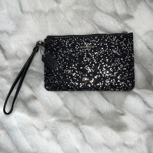 Star 💫 Coach 🖤 wristlet!